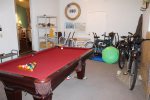 In the garage is a Pool table